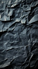 Midnight paper peaks fold shadows into jagged constellations