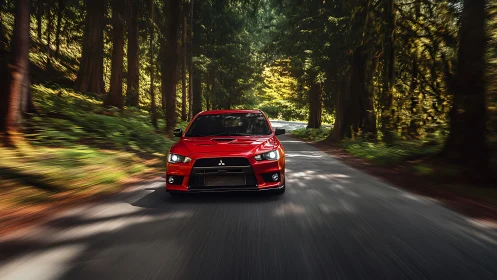 Bold red sports car enjoys a spirited drive through the forest