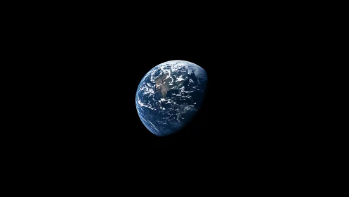 Earth half-illuminated in deep black space from orbit.