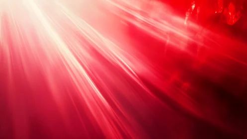 Vibrant red abstract light beams with dynamic motion effect.