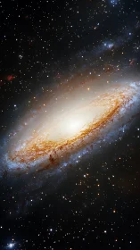 Spiraling golden galaxy glows softly amid countless quiet stars