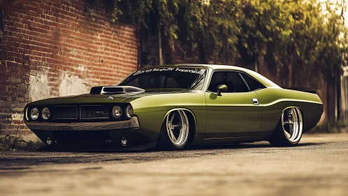 Low-slung lime muscle car beside rustic brick wall at dusk.