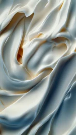 Macro folds of pearlescent satin fabric under soft lighting