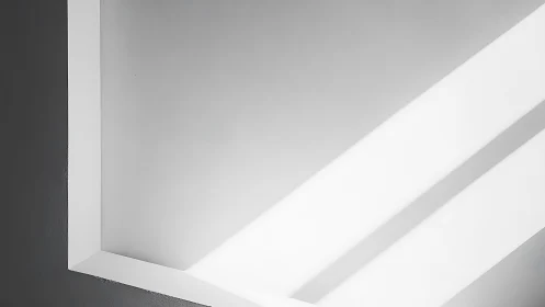 Minimalist corner wall with diagonal light beams study.