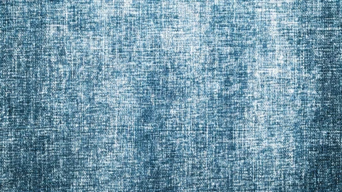 Blue woven fabric texture shows dense vertical and horizontal lines
