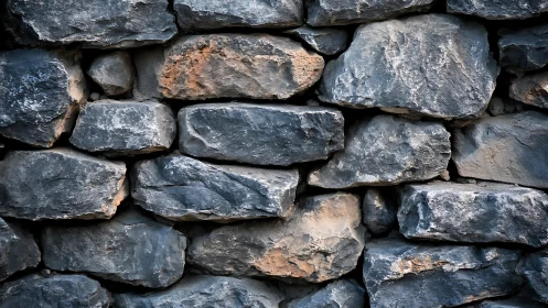 Rough stone wall texture with natural colors, rustic style.