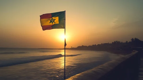 Sunset illuminates coastal flag in calm golden seascape