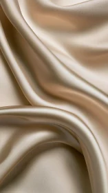 Folded satin fabric surface shows smooth draped structure