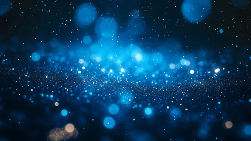 Blue bokeh particle field with shallow depth of focus.