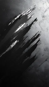 Monochrome diagonal paint streaks on textured surface.