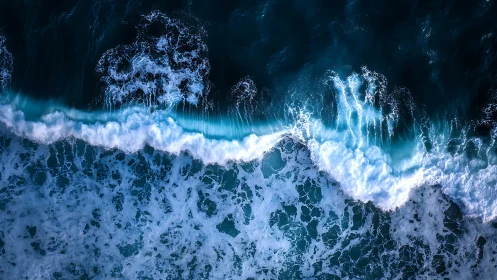 Rolling ocean waves caught in shimmering blue motion.