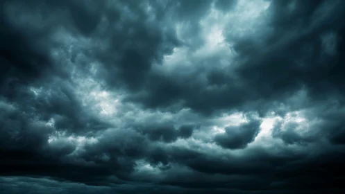 Storm-laden cumulonimbus sky with dramatic cyan highlights.
