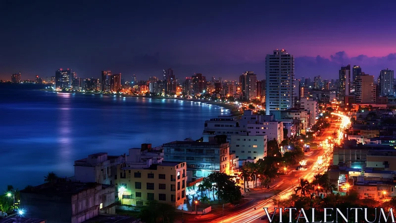 Coastal city skyline with illuminated waterfront at night.