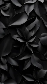 Monochrome macro foliage relief with layered matte black leaves