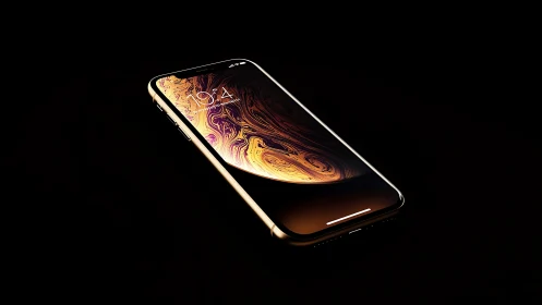 iPhone XS Max Gold with Abstract Liquid Wallpaper Display.