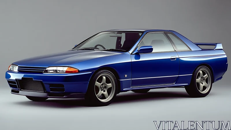 Blue two-door sports coupe is isolated in studio lighting