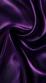 Folded purple satin fabric with smooth reflective texture.