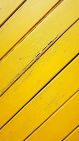 Sunlit yellow planks march diagonally in textured harmony