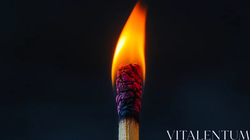 A Burning Match Glows with Vibrant Rainbow Fire