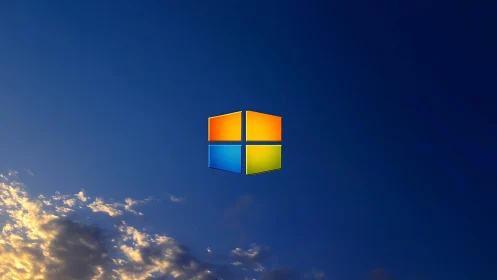 Windows-style four-color logo floats above deep blue sky