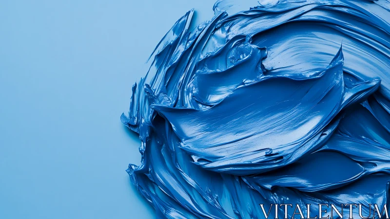 Rich blue paint textures swirl in a bold minimalist composition