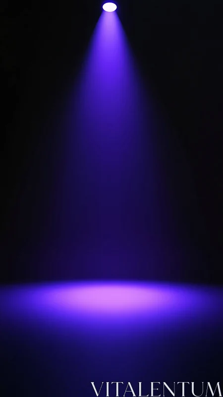 Purple stage spotlight beam on empty dark background.
