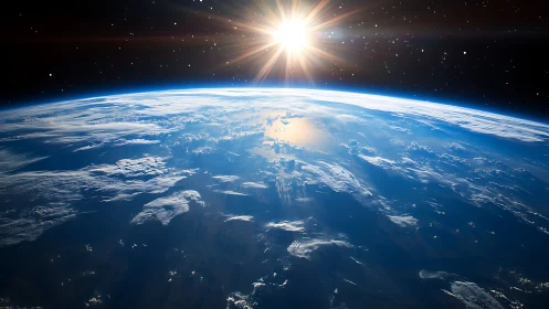 Sunrise over Earth’s curved horizon in vivid orbit view.