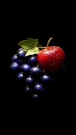 Glistening grape cluster crowns a ruby apple in velvet dark