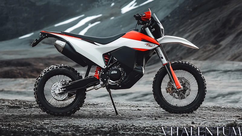Side-profile enduro motorcycle on volcanic gravel plateau.
