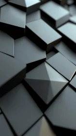 Tiled dark geometric prisms form staggered low-gloss 3D surface