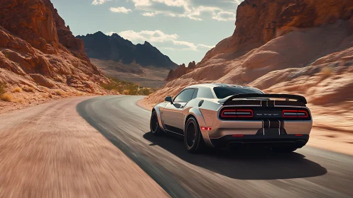 High-performance muscle car cornering through desert canyon road