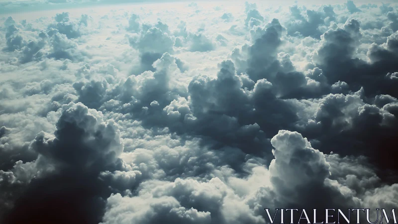 Cathedral of stormlit clouds above a softly glowing sky sea.