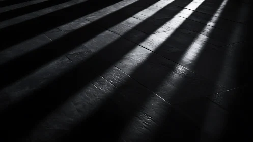 Oblique light bands cast high-contrast stripes across tiles