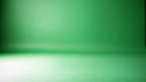Empty green chroma key studio cyc wall forms smooth backdrop