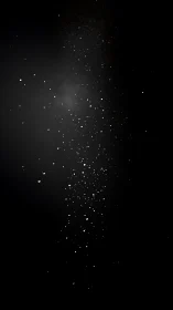 Fine particulate cloud suspended in dark negative space.