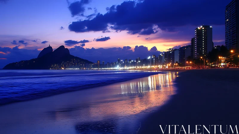 Rio beachfront skyline glows under deep blue twilight sky