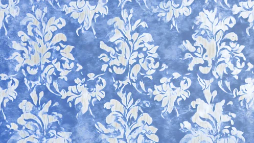Blue background with repeating white floral damask pattern.