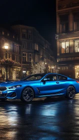 Metallic blue performance coupe parked on wet reflective city street