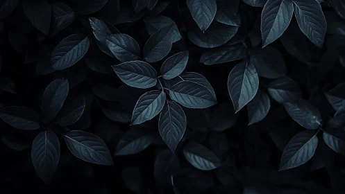 Midnight foliage pattern with cool blue-toned leaves