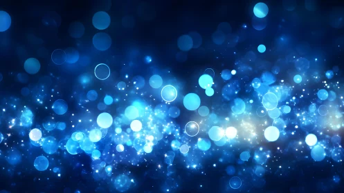 Abstract blue bokeh background with glowing light orbs and sparkles.