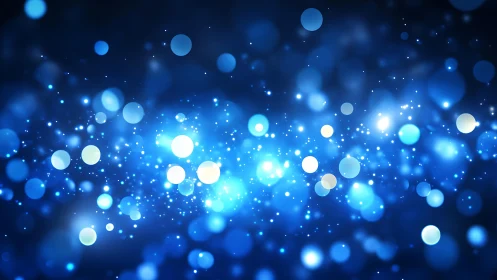 Abstract blue bokeh lights background with glowing particles.