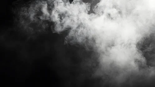 Ghostlike white smoke curling through a shadowed black void.