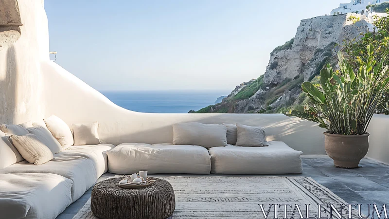 Outdoor lounge terrace overlooks rocky coast and sea