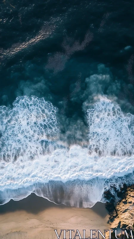 Gentle ocean waves rolling onto a quiet sandy shoreline.