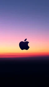 Apple logo silhouette centered on a calm gradient sky.