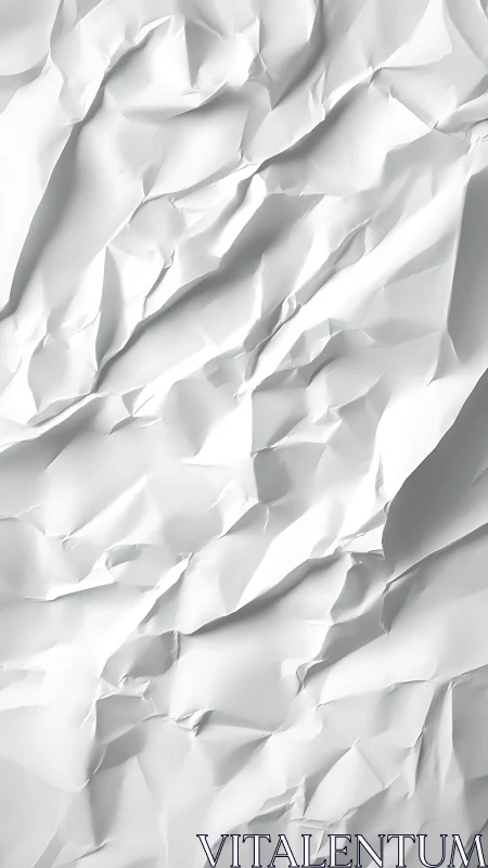 Crumpled white paper peaks sculpted into soft abstract terrain.