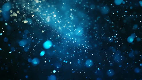 Soft blue stardust drifting through a dreamy night sky.