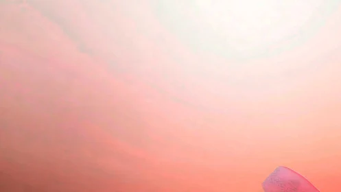 Minimal sky gradient with abstract pink object, digital study.