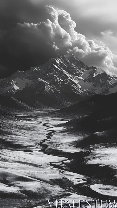 Serene snowy valley winding toward brooding stormy peaks.