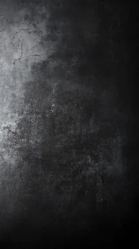 Dark textured concrete surface in vertical orientation.